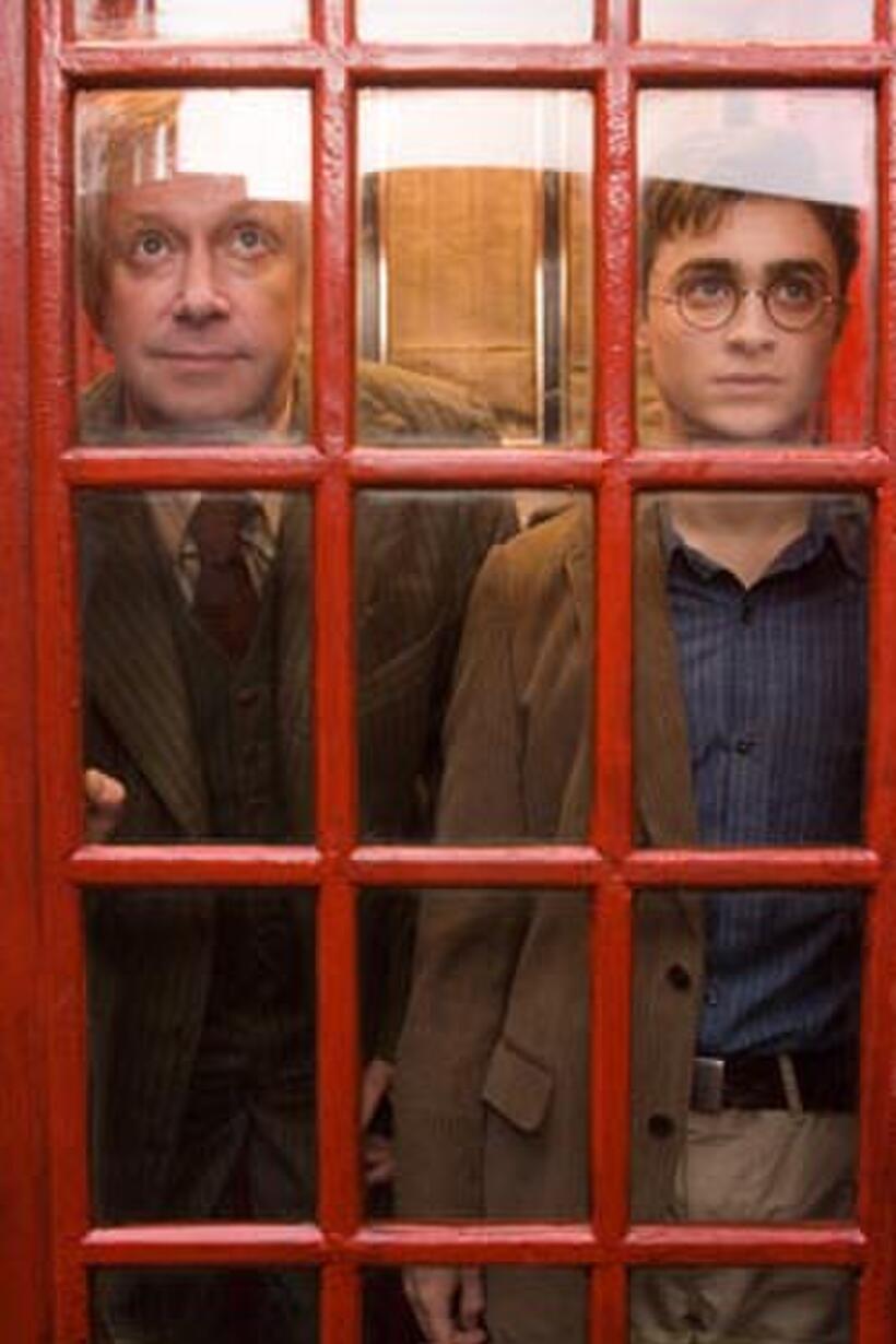 Mark Williams as Arthur Weasley and Daniel Radcliffe in "Harry Potter and the Order of the Phoenix."