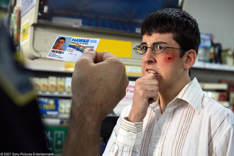 Fogell (Christopher Mintz-Plasse) – posing as McLovin, the 25-year-old Hawaiian organ donor – gets asked for some identification in "Superbad."