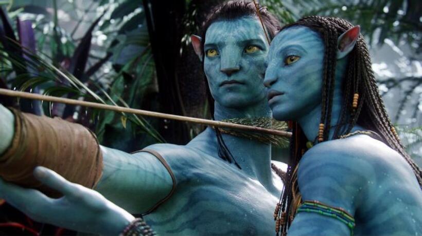 Sam Worthington as Jake Sully and Zoe Saldana as Neytiri in "Avatar."