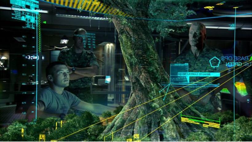 Sam Worthington as Jake Sully and Stephen Lang as Quaritch in "Avatar."