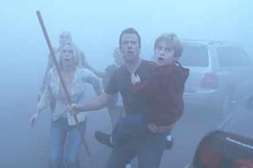 Laurie Holden, Thomas Jane, Nathan Gamble in "The Mist."