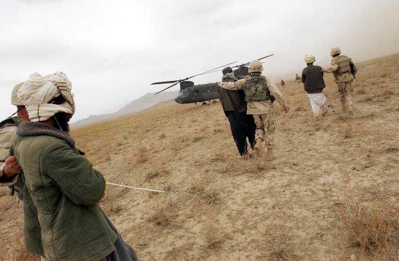 Afghani detainees in "Taxi to the Dark Side."