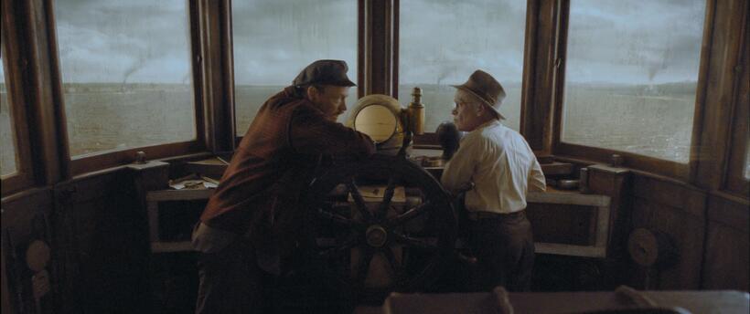 Jared Harris as Captain Mike and Brad Pitt as Benjamin Button in "The Curious Case of Benjamin Button."