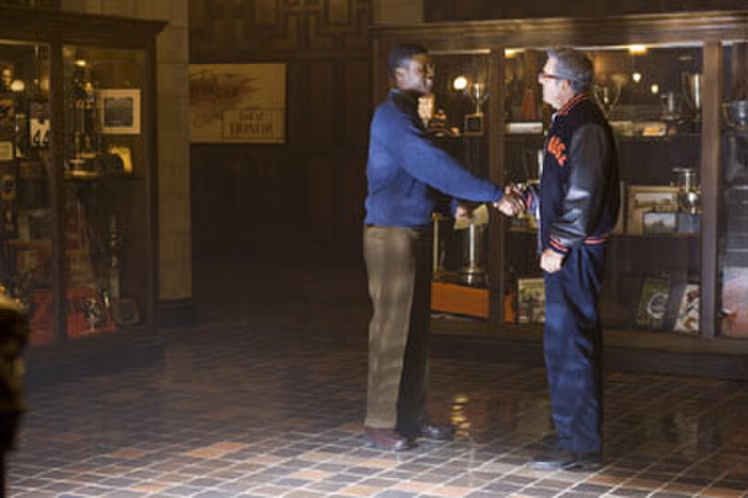 Rob Brown and Dennis Quaid in "The Express."