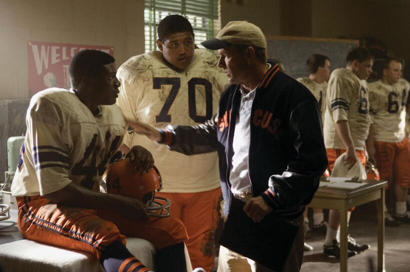 Rob Brown as Ernie Davis, Omar Benson Miller as Jack Buckley and Dennis Quaid as Coach Ben Schwartzwalder in "The Express."