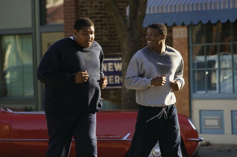 Omar Benson Miller as Jack Buckley and Rob Brown as Ernie Davis in "The Express."