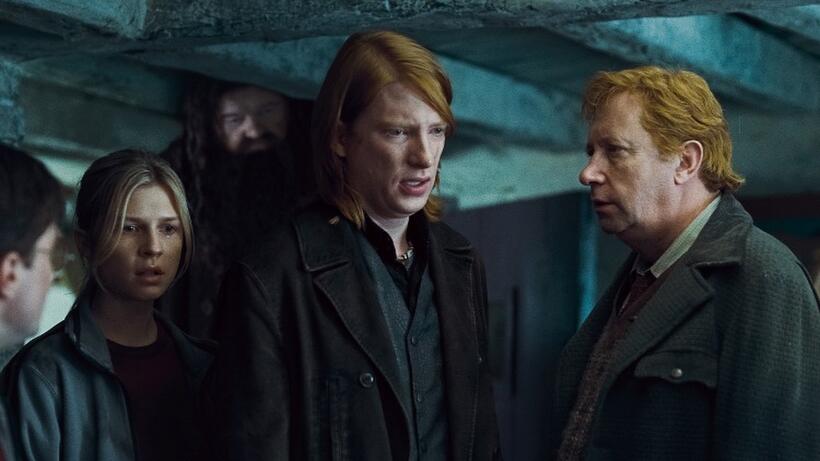 Clemence Poesy as Fleur Delacour, Robbie Coltrane as Rubeus Hagrid, Domhnall Gleeson as Bill Weasley and Mark Williams as Arthur Weasley in "Harry Potter and the Deathly Hallows - Part 1."