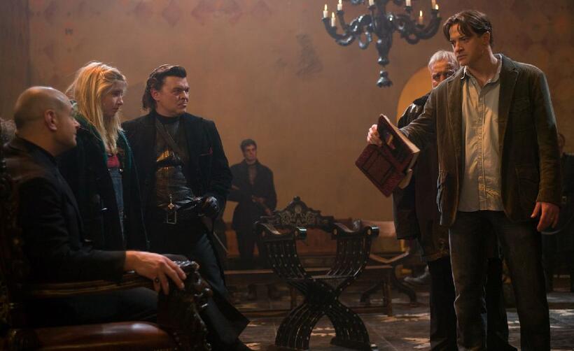 Andy Serkis as Capricorn, Eliza Hope Bennett as Meggie, Jamie Foreman as Basta and Brendan Fraser as Mo in "Inkheart."