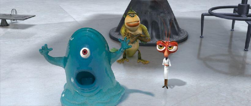 Seth Rogen as B.O.B., Will Arnett as The Missing Link and Hugh Laurie as Dr. Cockroach, Ph.d. in "Monsters Vs. Aliens."
