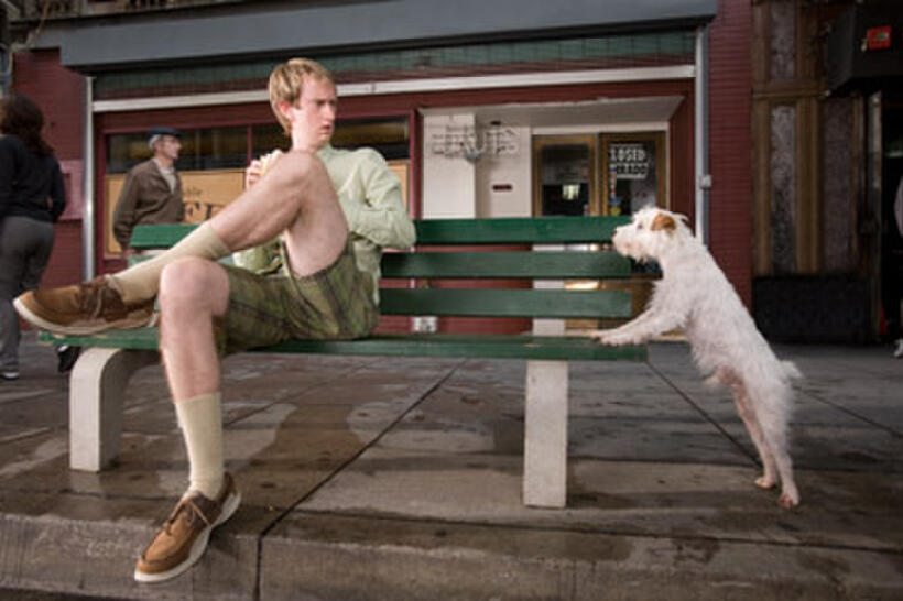 An innocent bystander (left) is stalked by the perpetually hungry dog Friday in "Hotel for Dogs." 