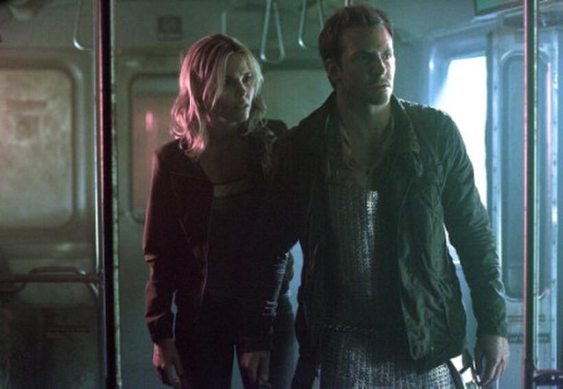 Leslie Bibb as Maya and Bradley Cooper as Leon in "The Midnight Meat Train."