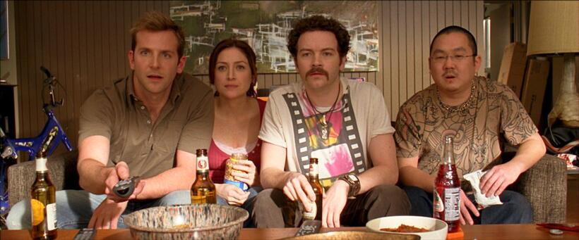 Bradley Cooper as Peter, Sasha Alexander as Lucy, Danny Masterson as Rooney and Aaron Takahashi as Lee in "Yes Man."