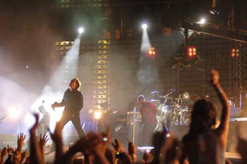 U2 onstage in "U2 3D."  