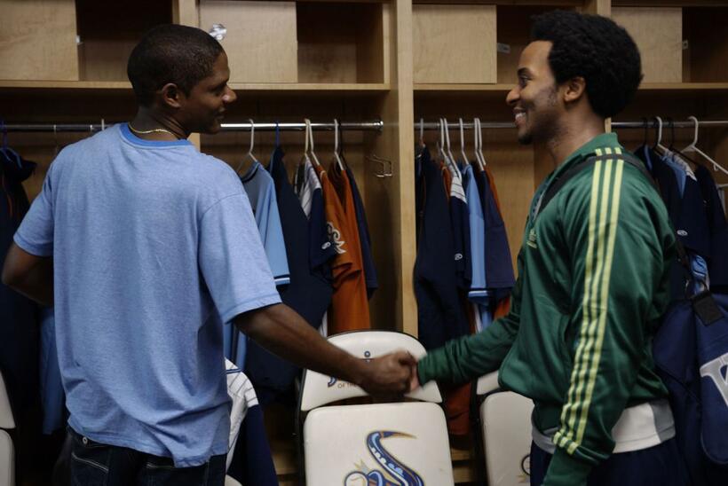 Algeniz Perez Soto as Miguel and Andre Holland as Brad in "Sugar."