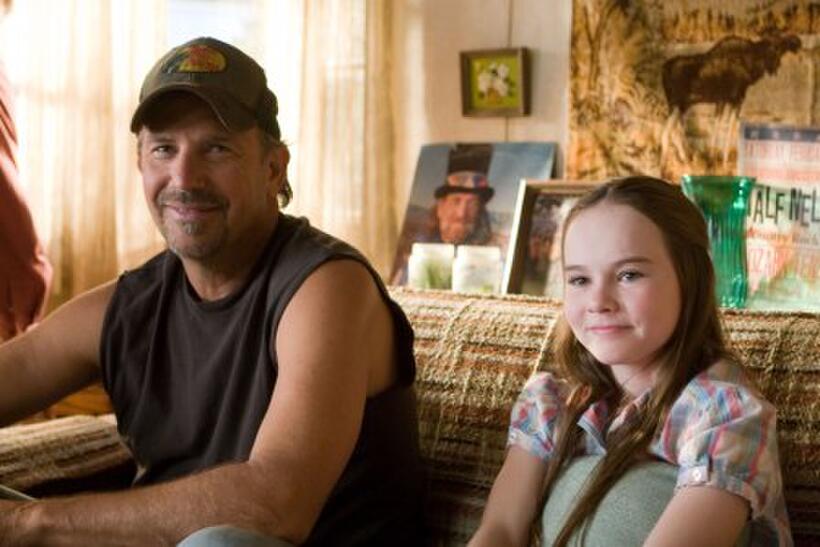 Kevin Costner and Madeline Carroll in "Swing Vote."