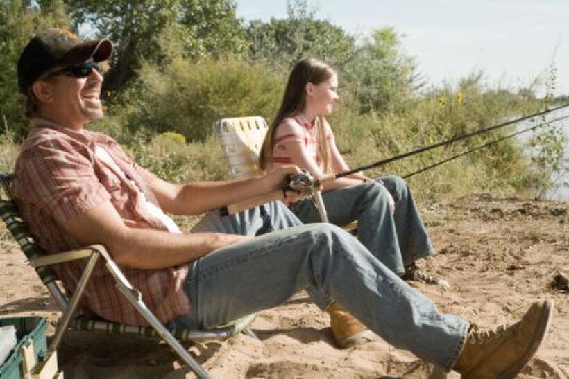 Kevin Costner and Madeline Carroll in "Swing Vote."
