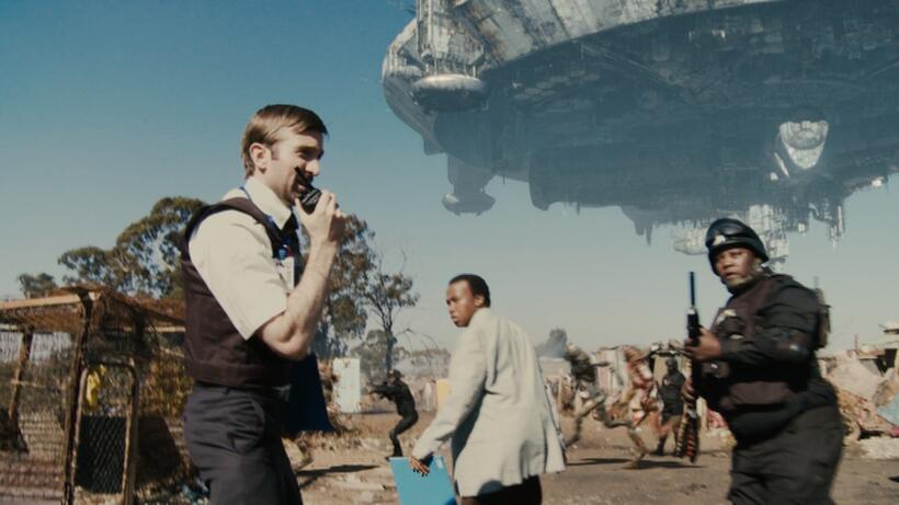 Sharlto Copley, Mandla Gaduka and Kenneth Nkosi in "District 9."