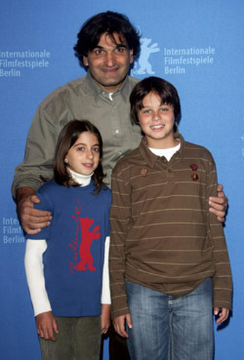 Director Cao Hamburger, actors Daniela Piepszy and Michel Joelsas at a photocall for "The Year My Parents Went On Vacation" during the 57th Berlin International Film Festival.