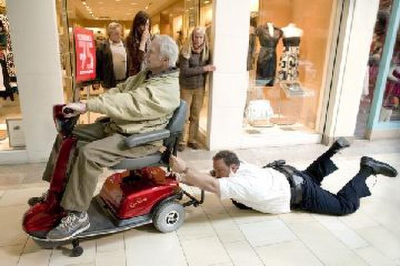 Bernie McInerney as Old Man and Kevin James as Paul Blart in "Paul Blart: Mall Cop."
