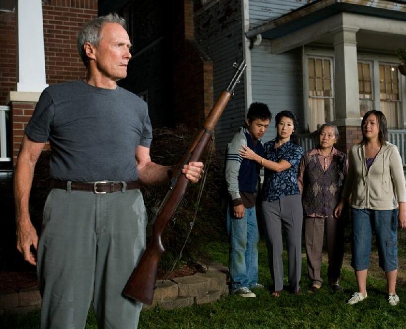 Clint Eastwood as Walt Kowalski, Bee Vang as Thao, Brooke Chia Thao as Vu, Chee Thao as Grandma and Ahney Her as Sue in "Gran Torino."