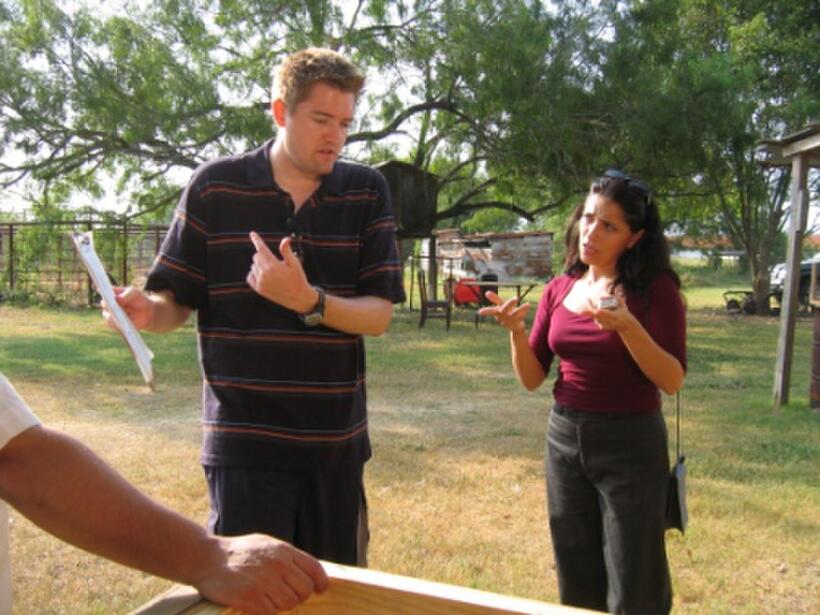 Director Chris Eska and Sandra Rios on the set of "August Evening."