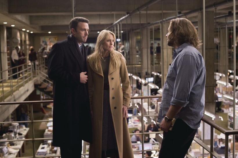 Ben Affleck as Stephen Collins, Robin Wright Penn as Anne and Russell Crowe as Cal McAffrey in "State of Play."