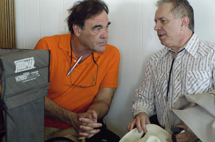 Director Oliver Stone and Stanley Weiser on the set of "W."