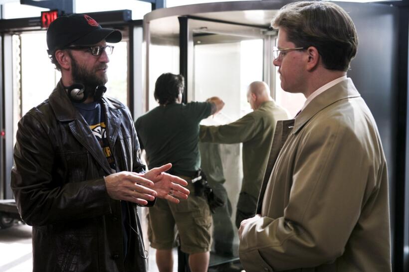 Director Steven Soderbergh and Matt Damon on the set of "The Informant!"