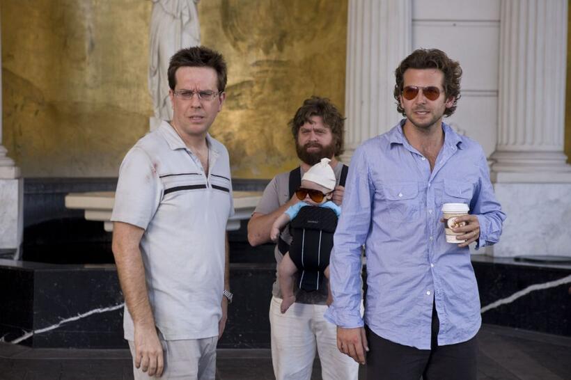 Ed Helms as Stu, Zach Galifianakis as Alan, Baby Tyler and Bradley Cooper as Phil in "The Hangover."