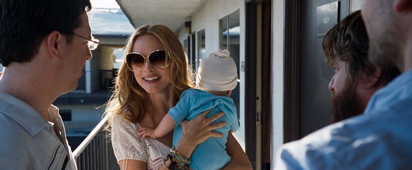 Ed Helms as Stu, Heather Graham as Jade, Baby Tyler and Zach Galifianakis as Alan in "The Hangover."