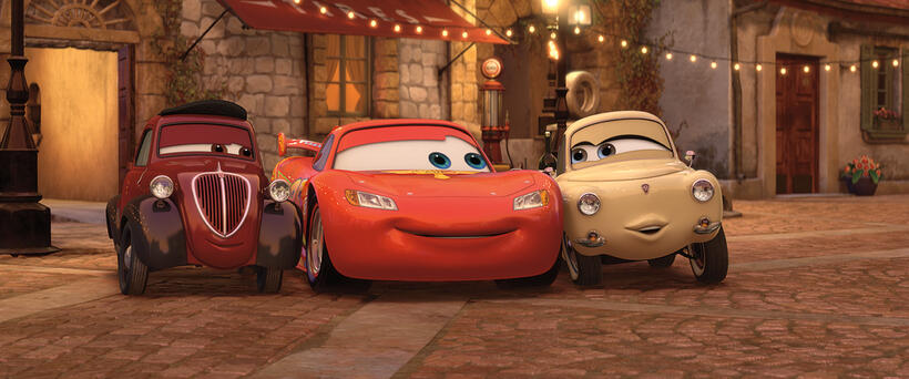 Uncle Topolino, Lightning McQueen and Mama Topolino in "Cars 2."
