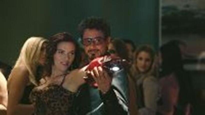 Scarlett Johansson as Natasha Romanoff and Robert Downey Jr. as billionaire industrialist Tony Stark in "Iron Man 2."