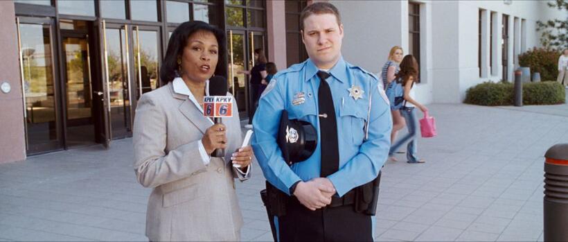 Debra-Jayne Brown as a reporter and Seth Rogen as Ronnie in "Observe and Report."