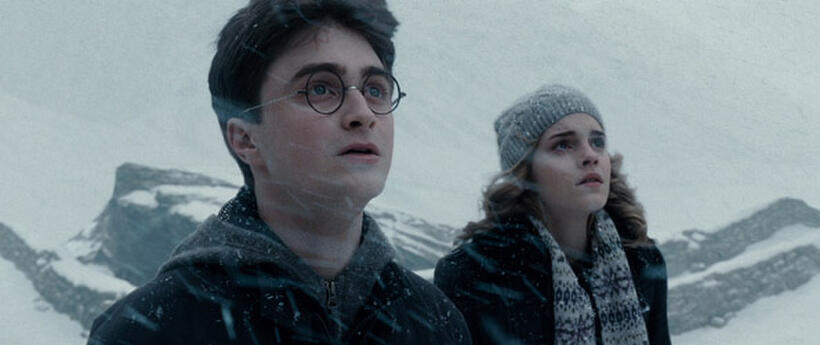 Daniel Radcliffe as Harry Potter and Emma Watson as Hermione Granger in Harry Potter and The Half-Blood Prince." 