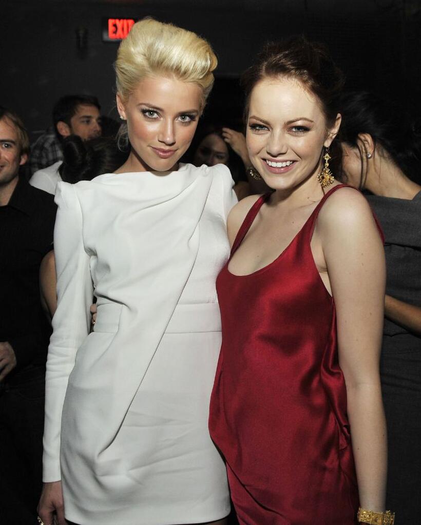 Amber Heard and Emma Stone at the after party of the California premiere of "Zombieland."