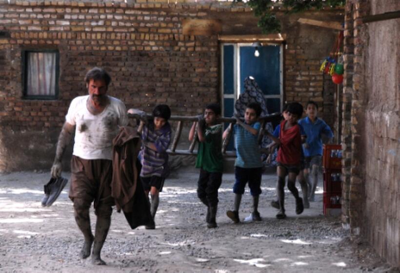 Reza Naji as Karim and Hamed Aghazi as Hussein in "The Song of Sparrows."