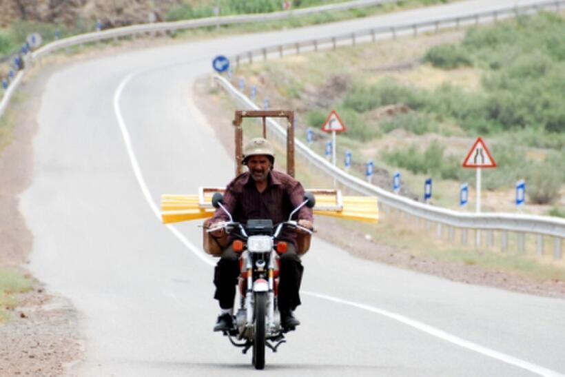Reza Naji as Karim in "The Song of Sparrows."