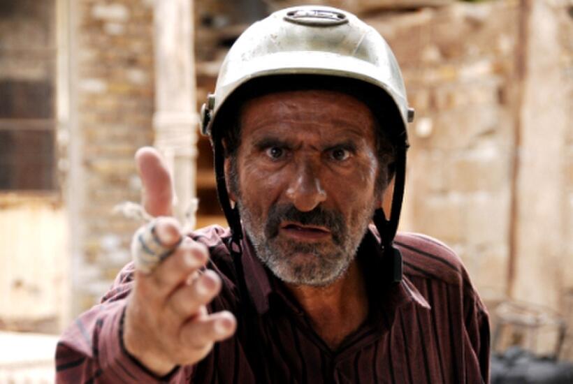 Reza Naji as Karim in "The Song of Sparrows."
