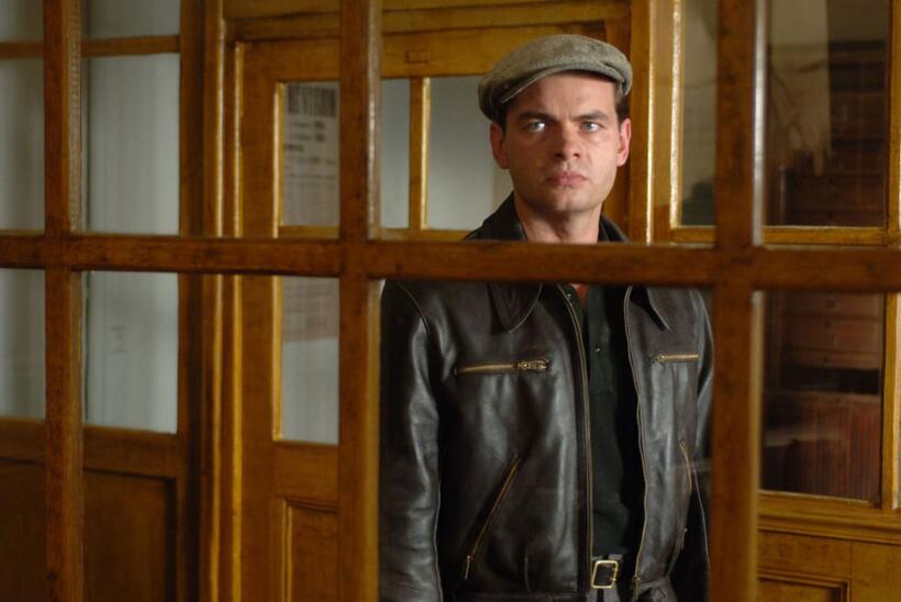 Clovis Cornillac as Milou in "Paris 36."