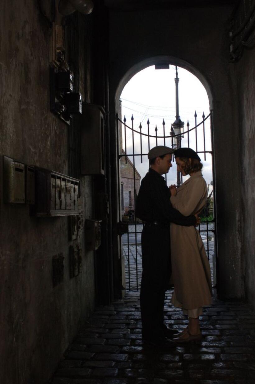 Clovis Cornillac as Milou and Nora Arnezeder as Douce in "Paris 36."