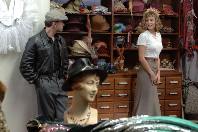 Clovis Cornillac as Milou and Nora Arnezeder as Douce in "Paris 36."