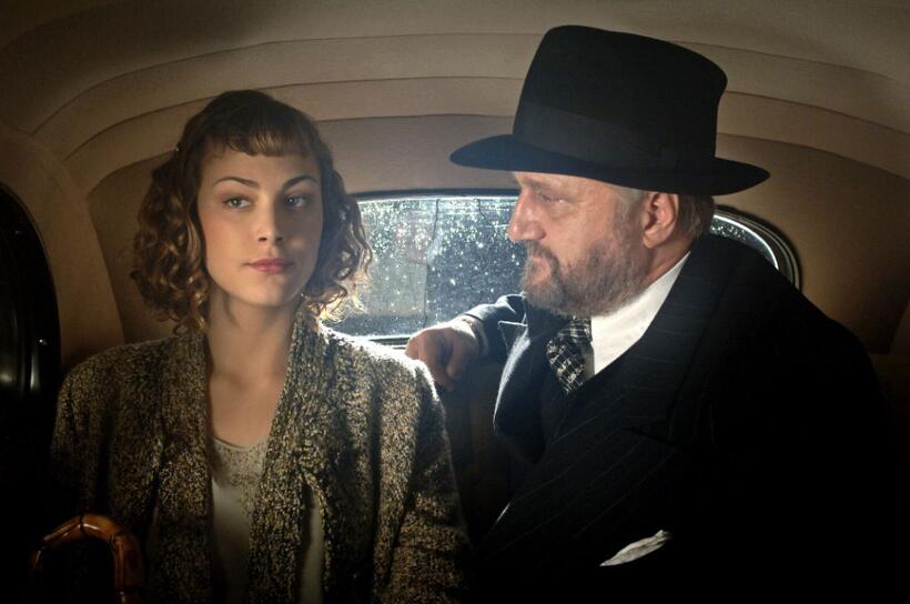Nora Arnezeder as Douce and Bernard-Pierre Donnadieu as Galapiat in "Paris 36."