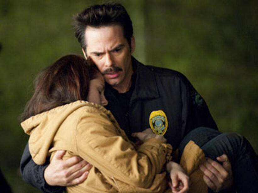 Kristen Stewart and Billy Burke in "The Twilight Saga: New Moon." 