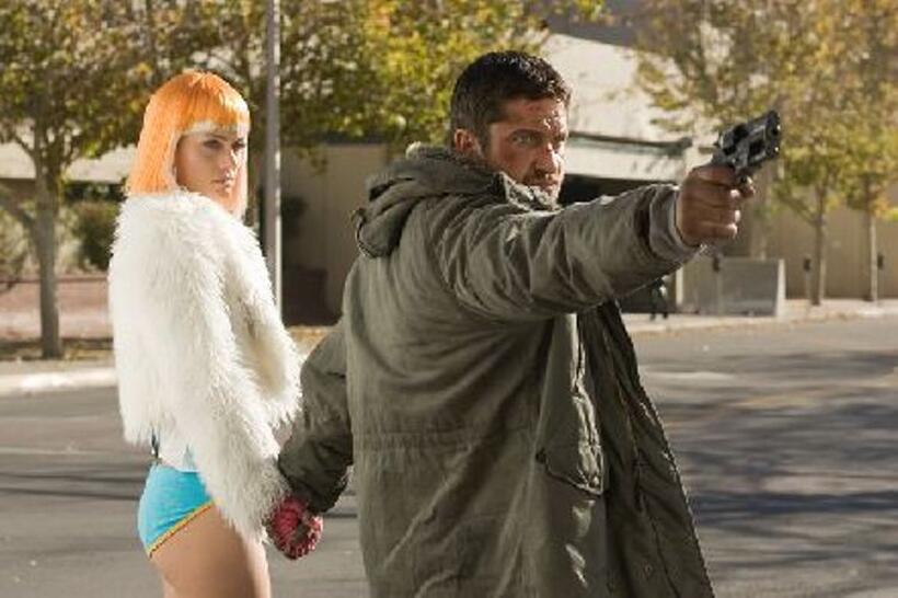 Amber Valetta as Angie and Gerard Butler as Kable in "Gamer."