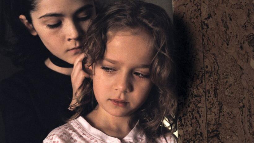 Isabelle Fuhrman as Esther and Aryana Engineer as Max in "Orphan."