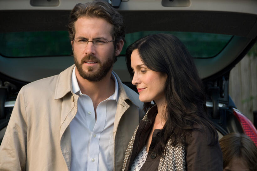 Ryan Reynolds and Carrie-Anne Moss in "Fireflies in the Garden."