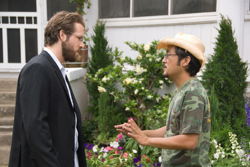 Ryan Reynolds and director/screenwriter Dennis Lee on the set of "Fireflies in the Garden."