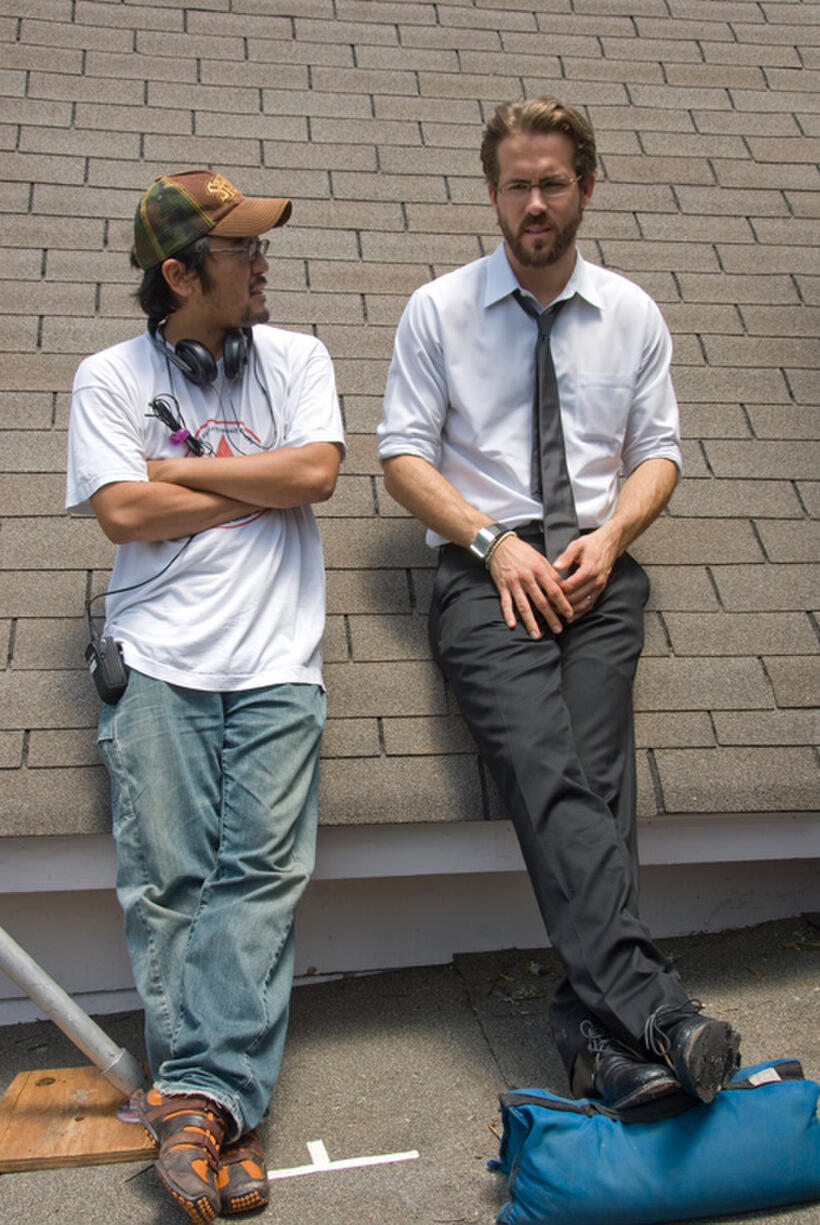 Director/screenwriter Dennis Lee and Ryan Reynolds on the set of "Fireflies in the Garden."