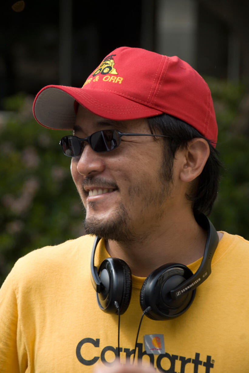Director/screenwriter Dennis Lee on the set of "Fireflies in the Garden."