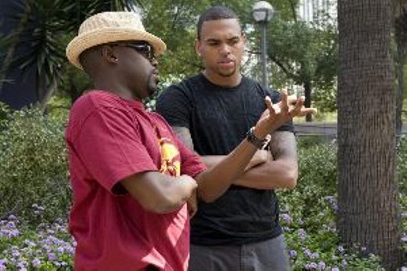 Producers Will Packer and executive producer Chris Brown on the set of "Takers."